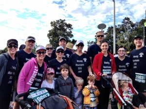 Kristy (in the centre wearing a white cap) after completing the Gold Coast Airport Marathon. 